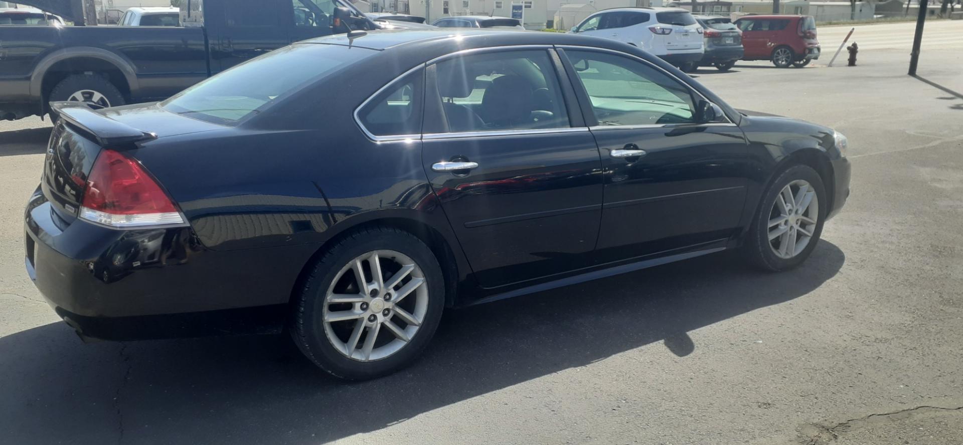 2016 Chevrolet Impala Limited LTZ (2G1WC5E3XG1) with an 3.6L V6 DOHC 16V FFV engine, 6A transmission, located at 2015 Cambell Street, Rapid City, SD, 57701, (605) 342-8326, 44.066433, -103.191772 - CARFAX AVAILABLE - Photo#3